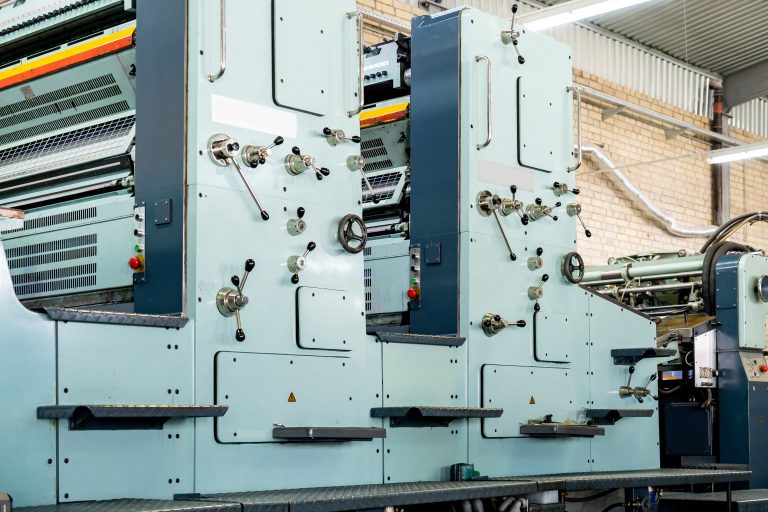 Press printing printshop Offset machine. Offset press is a printing machine designed to produce fine quality reproductions